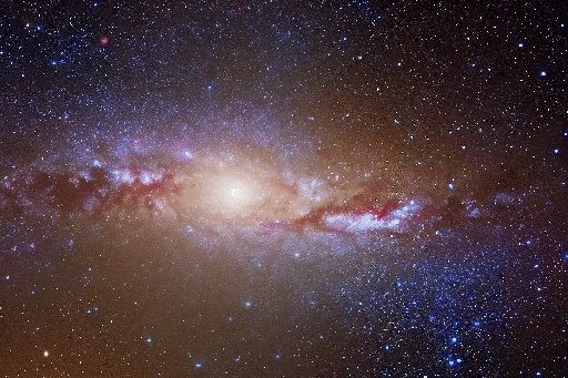 a galaxy with a bright red center